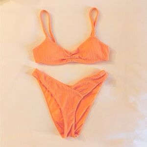 Dippin’ Daisy’s Textured Orange Bikini Two-Piece Set